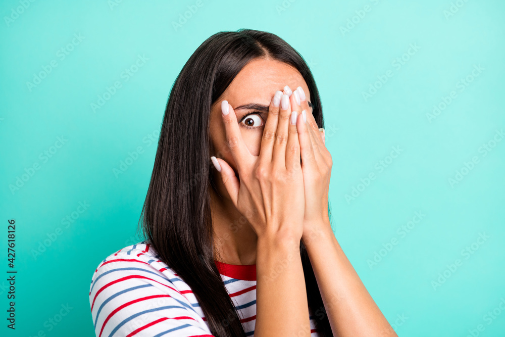 Portrait of stressed brunette hairdo lady cover face wear colorful t-shirt isolated on teal color background Portrait of stressed brunette hairdo lady cover face wear colorful t-shirt isolated on teal color background