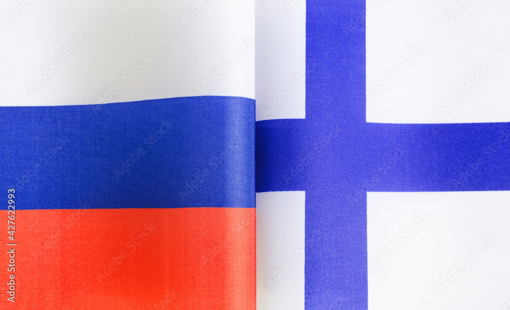 Obraz premium fragments of the national flags of Russia and Finland close-up