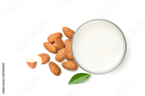 Flat lay (top view) of Almond milk with almond nuts isolated on white background.
