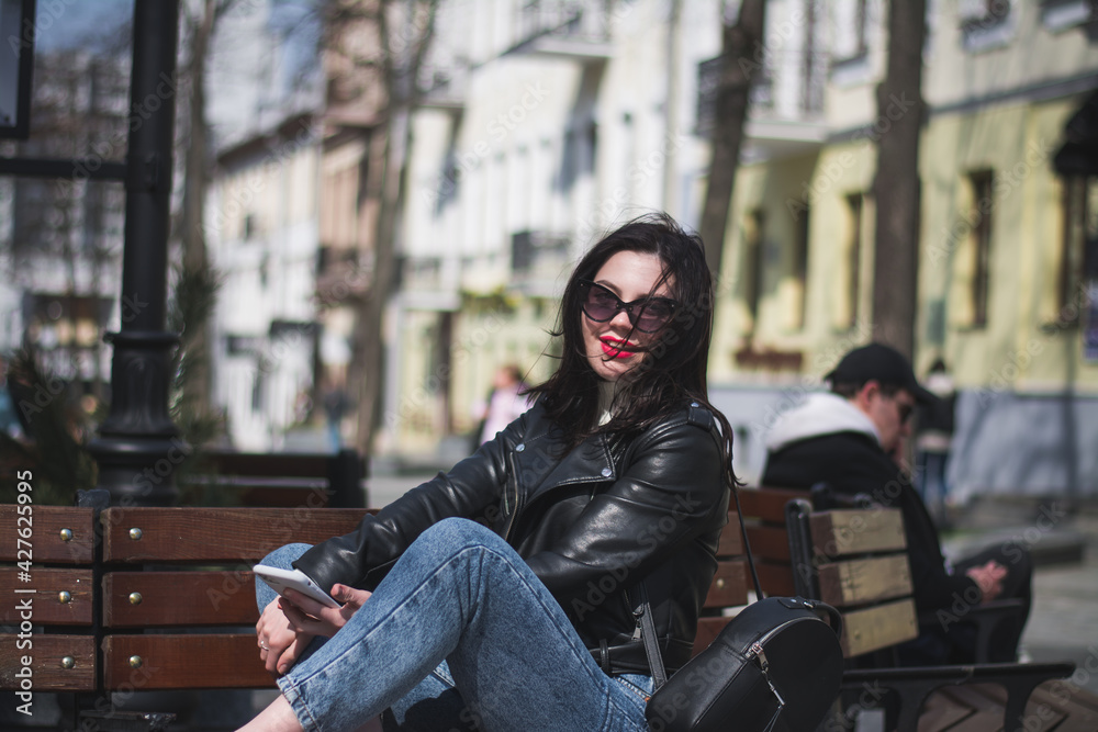 Fototapeta premium Outdoor lifestyle portrait of pretty girl