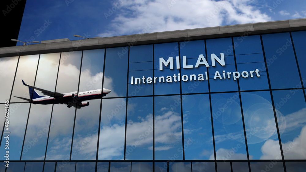 Obraz premium Airplane landing at Milan Italy airport mirrored in terminal