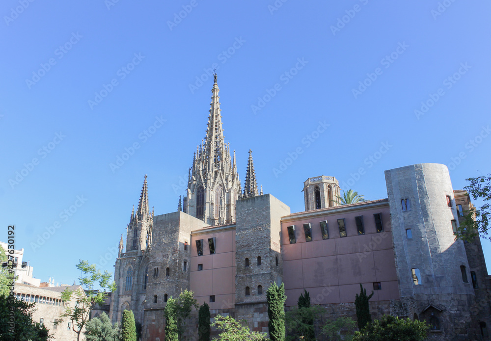 BARCELONA, SPAIN - OCT 24, 2019:Gothic Catholic Cathedral Facade Steeples Barcelona Catalonia Spain. This is the main spire.