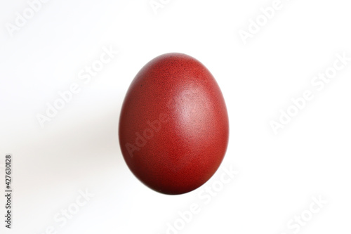 Easter red eggs on the white background.