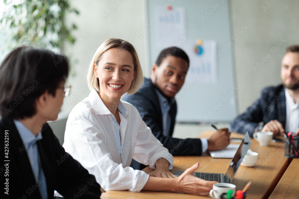 Successful Businesswoman On Corporate Meeting Smiling To Asian Businessman Indoor Successful Businesswoman On Corporate Meeting Smiling To Asian Businessman Indoor