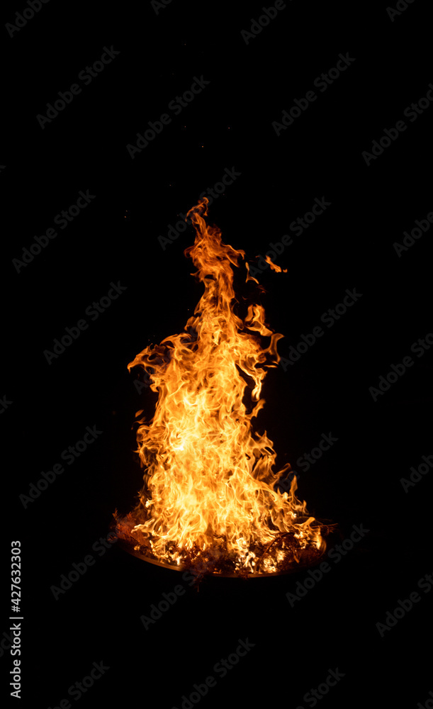 Fire in the backyard fire pit on a cool night
Fire in the backyard fire pit on a cool night