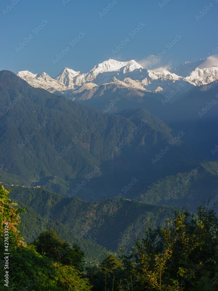 Scenic view on snow-capped Kangchenjunga in Himalaya mountain range seen from Pelling, Sikkim, India