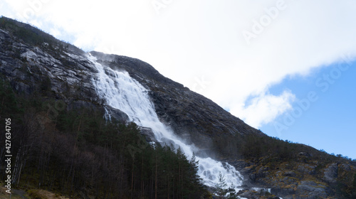 Langfossen, a waterfall located in the municipality of Etne in Vestland County, Norway, Scandinavia