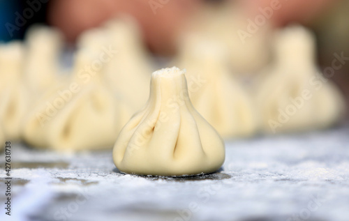 Cooking traditional georgian Khinkali