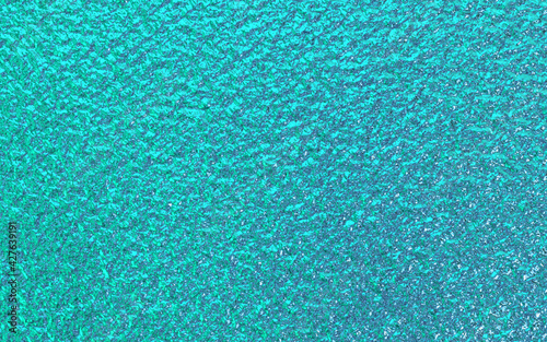 Teal green blue foil paper texture background.