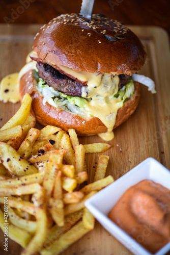 tasty delicious home made burgers with french fries