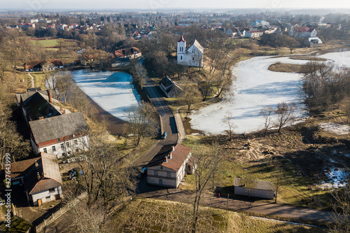 Fotografi Aerial view of Aizpute lutheran church, Latvia.
