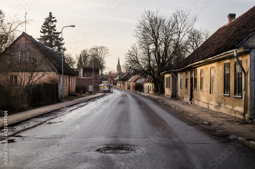 Street with old houses in Kuldiga, Latvia. © Bargais