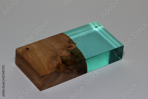 A piece of wood is filled with epoxy resin photo