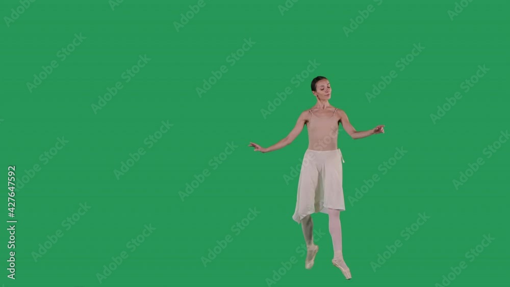 Elegant ballerina dancing classical ballet on green screen. Elegant ballerina dancing classical ballet on green screen.