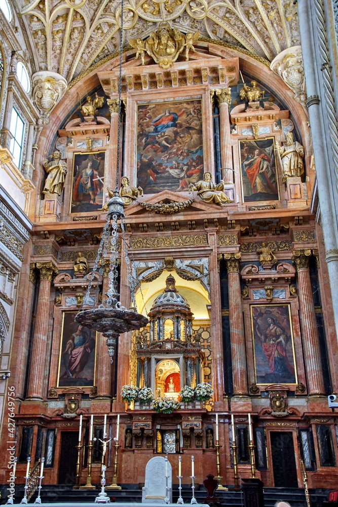 Interior view of La Mezquita Cathedral in Cordoba Spain. The cathedral was built inside of the former Great Mosque. Popular tourist destination in Spain.