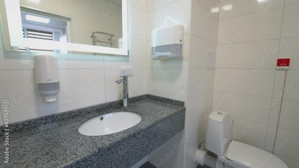 Luxurious Modern Bathroom Interior Design. Interior of bathroom with sink basin faucet Luxurious Modern Bathroom Interior Design. Interior of bathroom with sink basin faucet