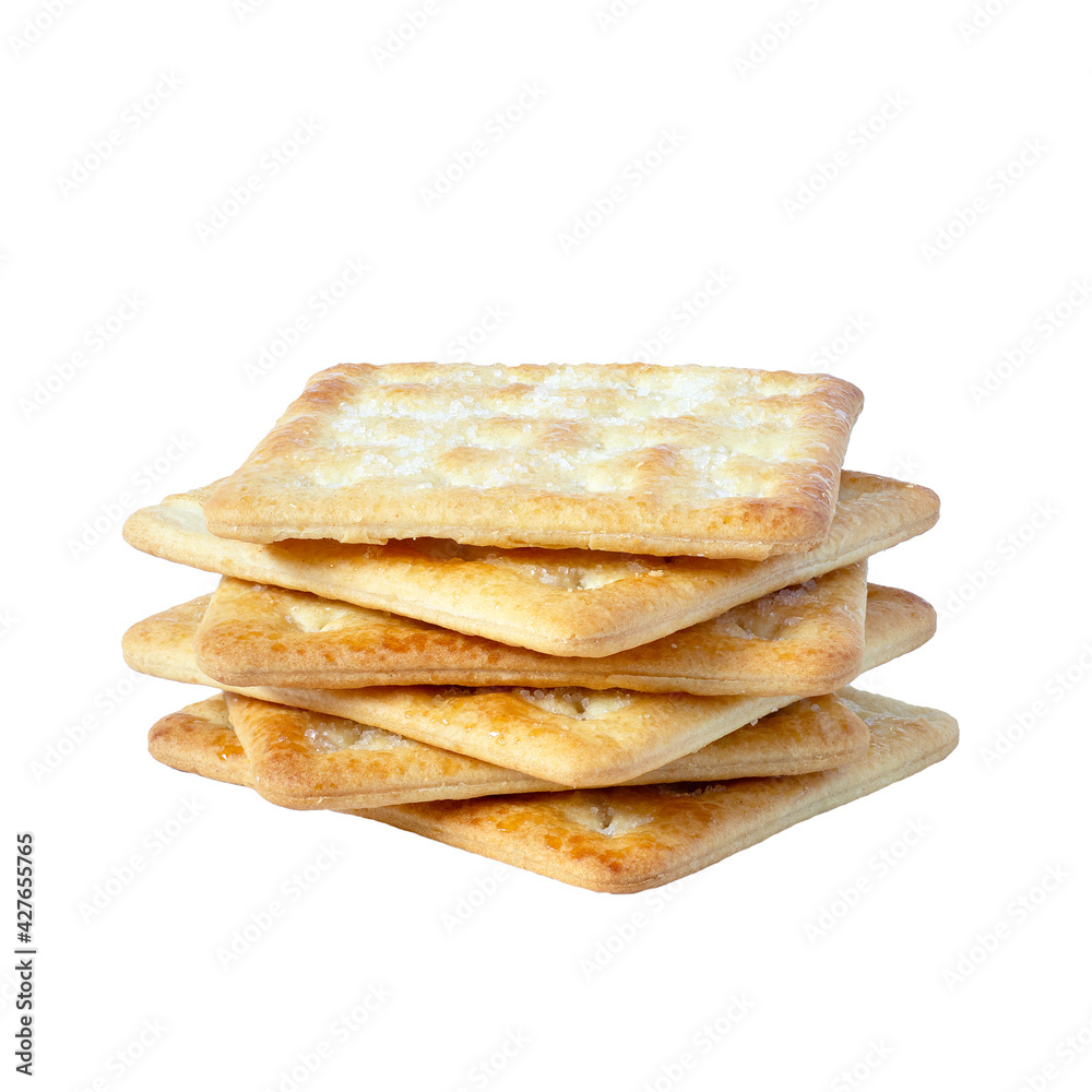 Close-up square dry crackers isolated on white background. Snack dry Biscuits healthy whole wheat tasty crispy crackers cookies for children and adults, clipping path, front view Close-up square dry crackers isolated on white background. Snack dry Biscuits healthy whole wheat tasty crispy crackers cookies for children and adults, clipping path, front view