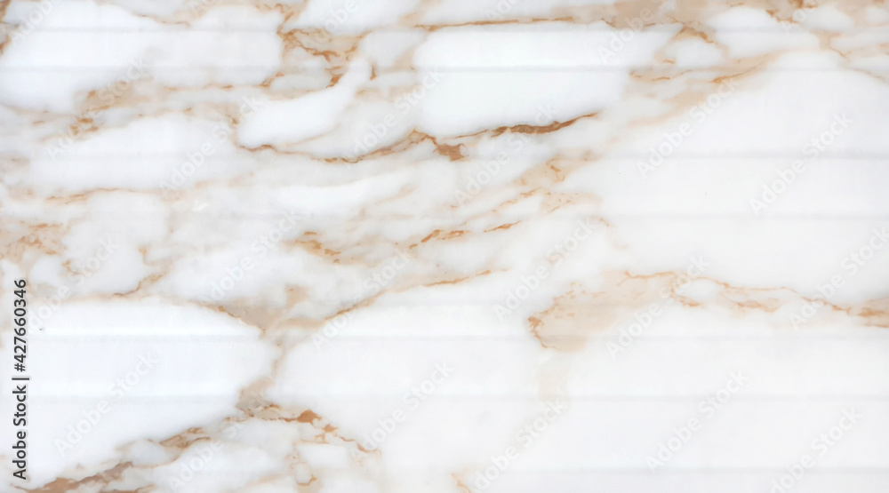 ribbed white marble stone tile with beautiful golden veins background. marble texture natural background for Interiors design, stone wall art work. ribbed white marble stone tile with beautiful golden veins background. marble texture natural background for Interiors design, stone wall art work.