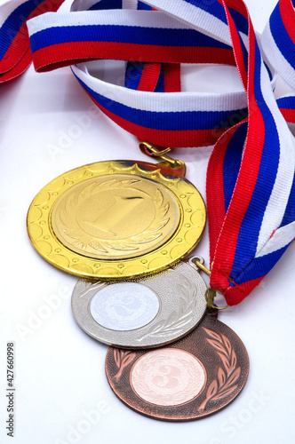 Medals for sports achievements. Awards for success in sports. Reward gold silver bronze.