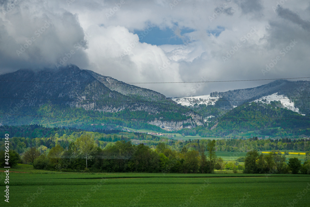 View through the train window to the Swiss mountains, Switzerland