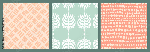 Set of abstract minimalist seamless boho patterns with hand drawn dots and leaves in a mid century style in a natural earthy palette. Modern aesthetic background with trendy design for wallpaper.