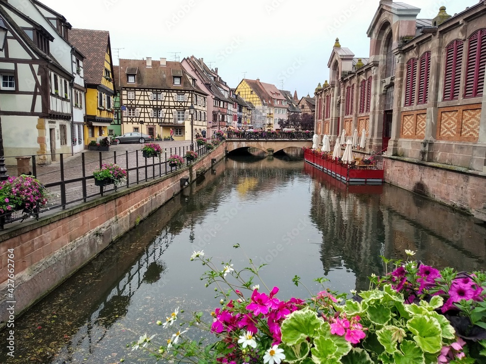 The picturesque streets of Colmar, Alsace with its typical colorful houses. France.