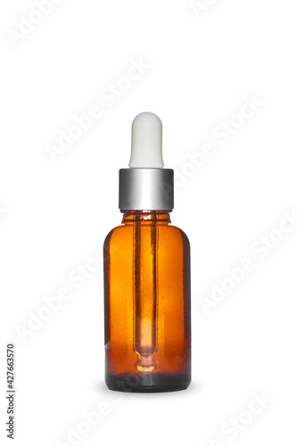 Amber dropper glass bottle on white background. Isolated and mockup