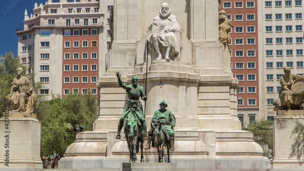 Stone sculpture of Miguel de Cervantes timelapse hyperlapse and bronze sculptures of Don Quixote and Sancho Panza on the Square of Spain (Plaza de Espana). Madrid is a popular tourist destination of