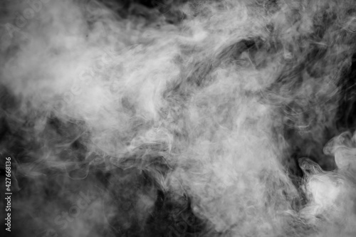 White smoke on a black background. Texture