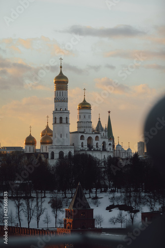 Russia. Sunset view of Moscow Kremlin. Architecture and landmark, cityscape. White Church with golden domes.