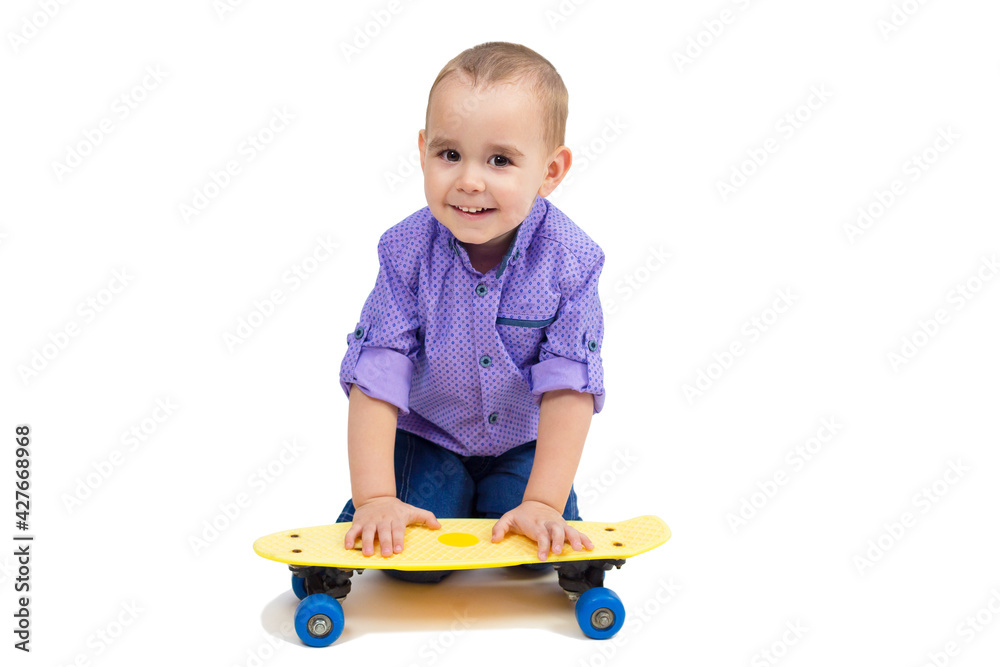 Child playing with roller board young skateboarder. Child playing with roller board young skateboarder.