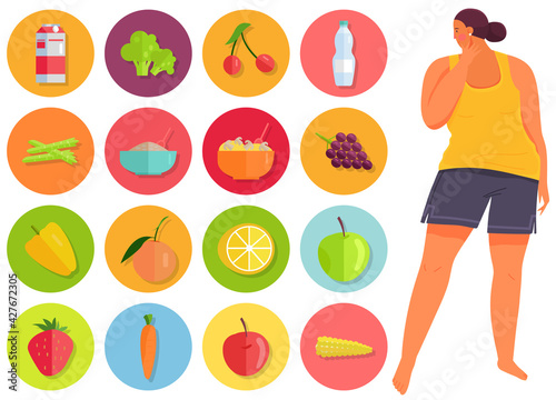 Overweight girl looks at symbols of fruits and vegetables. Proper nutrition and healthy lifestyle