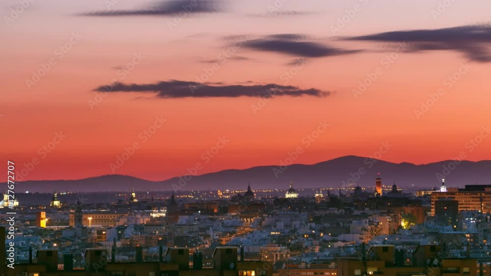 Panoramic day to night transition timelapse view of Madrid, Spain from the hills of Tio Pio Park, Vallecas-Neighborhood.