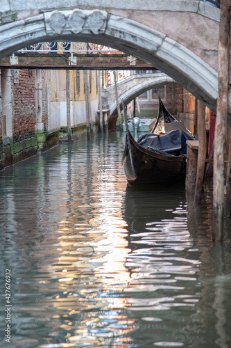 Venezia 2020. Boat under the bridges of Venice © silvia