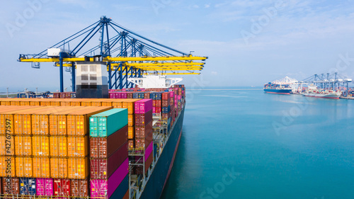 ear view cargo container ship. Business logistic transportation sea freight, Cargo container in deep sea port at industrial, Cargo ship,  Crane And Unloading Containers