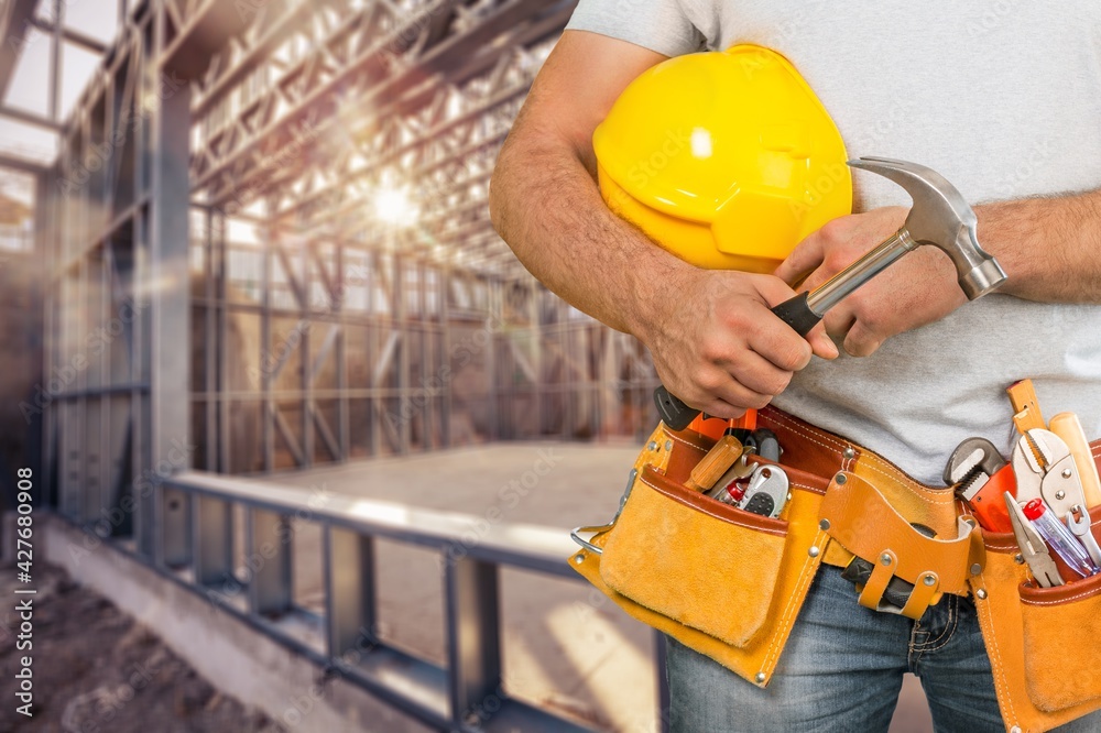 Man worker or professional builder with tools Man worker or professional builder with tools