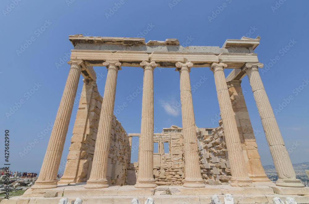 The ancient Parthenon temple on Acropolis hill, famous landmark and tourist attraction in Athens, Greece, in sunny summer day