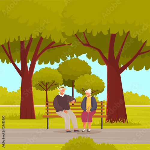 Old woman and man are resting and sitting on bench in park. Meeting of retirees from nursing home