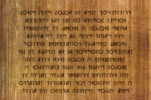 A wooden tablet, full of carved signs in Etruscan (a civilization of Italy in ancient times), fake text (it's the latin public domain Lorem Ipsum).
 photo