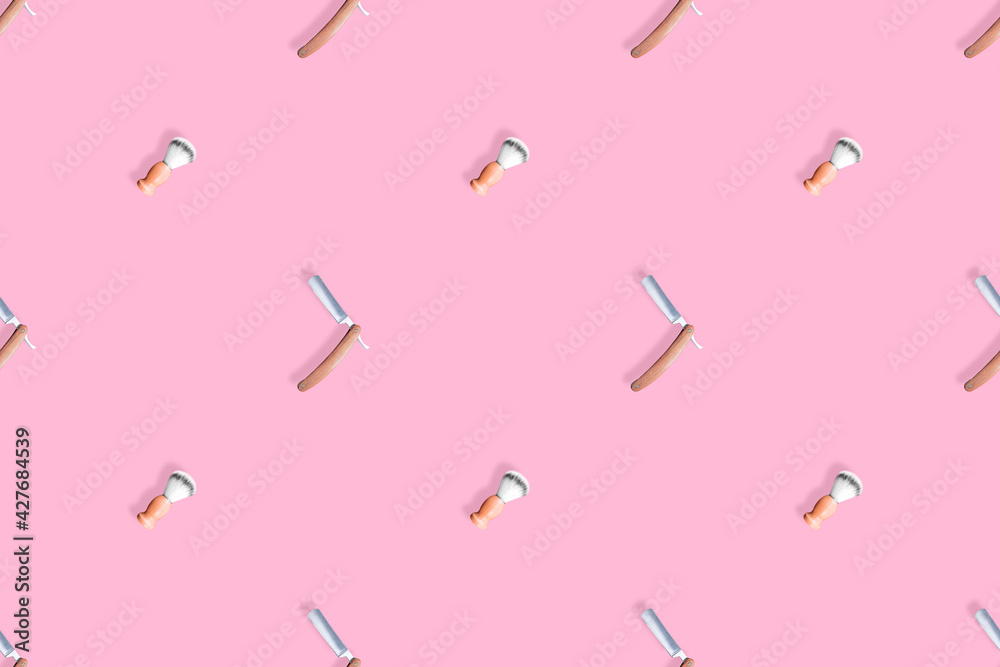 Seamless pattern on the theme of the barber shop. Straight razor and shaving brush background. Seamless pattern on the theme of the barber shop. Straight razor and shaving brush background.