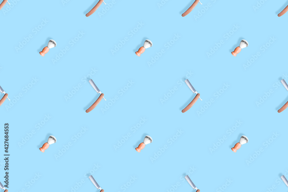 Seamless pattern on the theme of the barber shop. Straight razor and shaving brush background. Seamless pattern on the theme of the barber shop. Straight razor and shaving brush background.