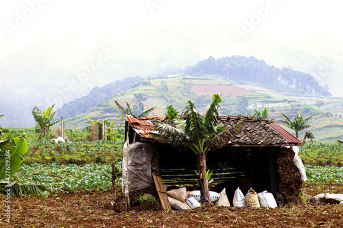 Traditional farm warehouse building at hill