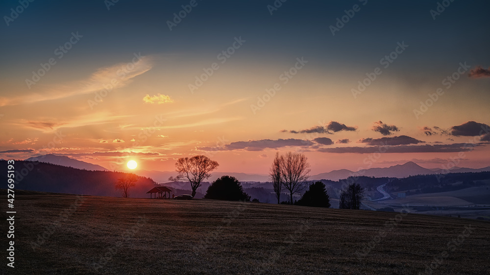 Obraz premium valley below the Tatras after sunset with nice colors of the sky