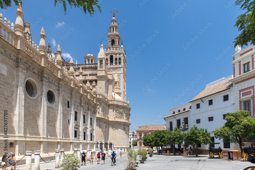 Beautiful city center of Seville with few tourist due the Coronavirus isolation measures. Cathedral of Seville and Triunfo Square in the center of Seville.