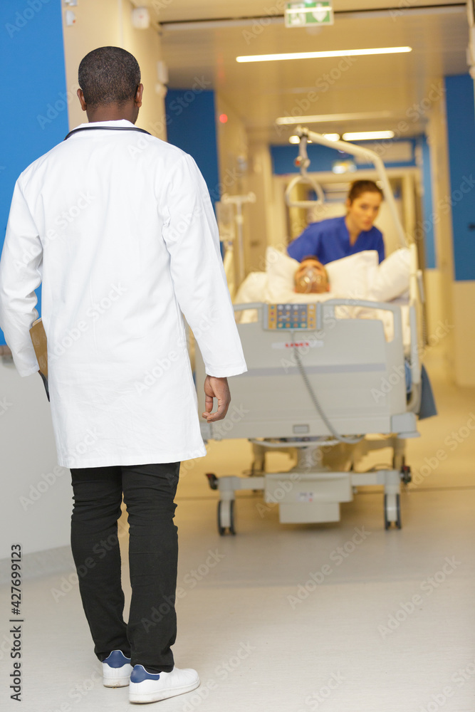a doctor carries a patient a doctor carries a patient