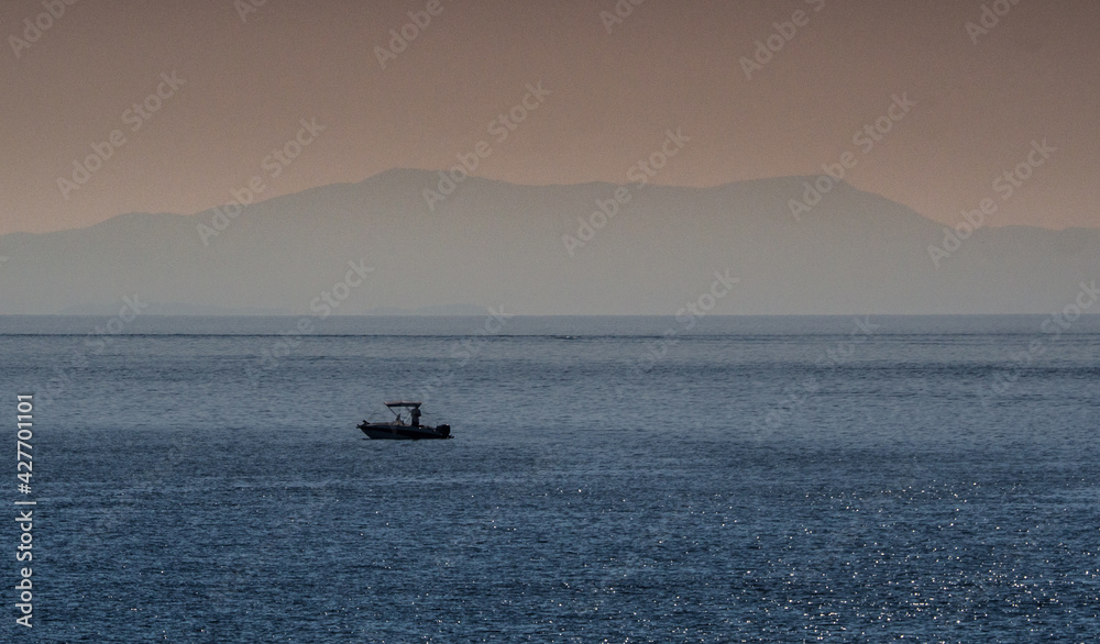 Naklejka premium Morze, zachód słońca