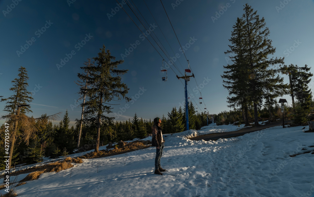 Chairlift from Hofmanky to Pancir hill in soon winter morning Chairlift from Hofmanky to Pancir hill in soon winter morning