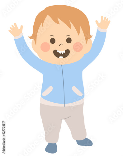 Cute happy baby boy first steps walking with arms up