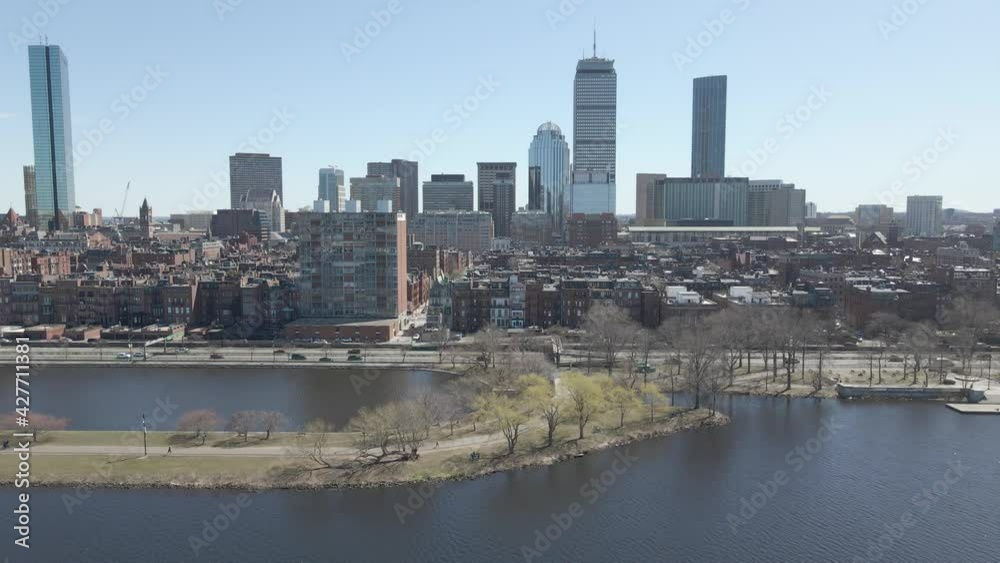 Boston, Massachusetts. Riverfront against cityscape. Establisher traveling shot Boston, Massachusetts. Riverfront against cityscape. Establisher traveling shot