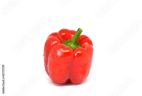 Red bell-pepper isolated on white, food element